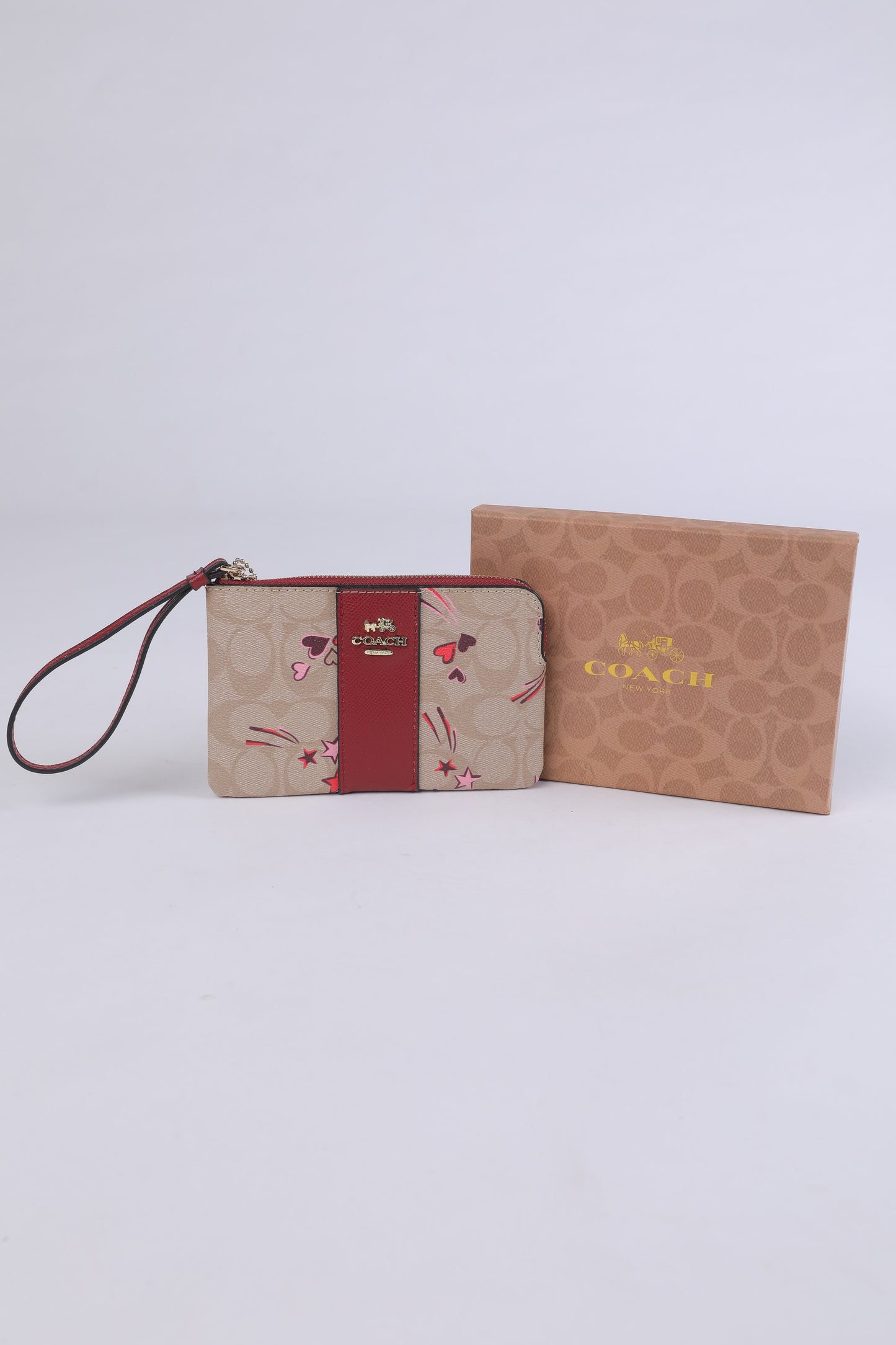 Coach Signature Heart & Star Print Wristlet