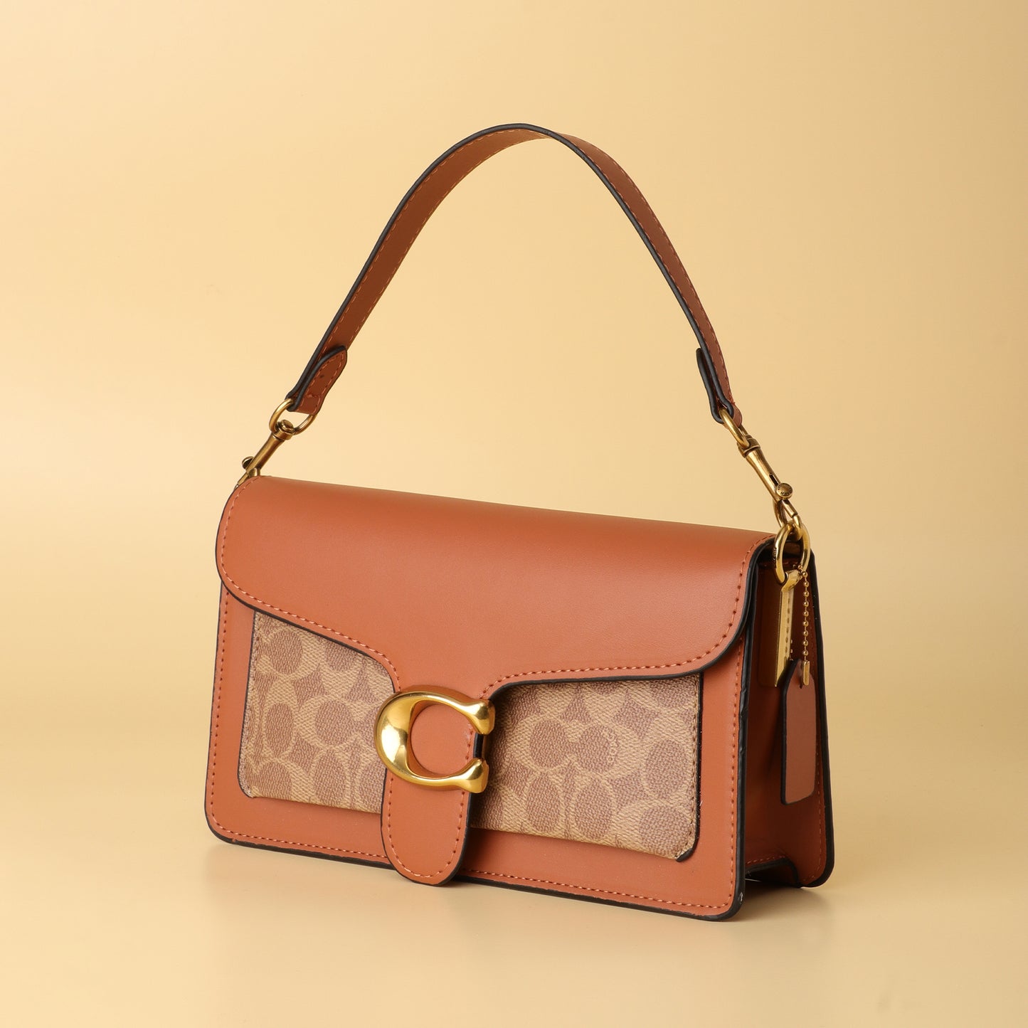 Tabby Shoulder Bag in Tan Signature Canvas