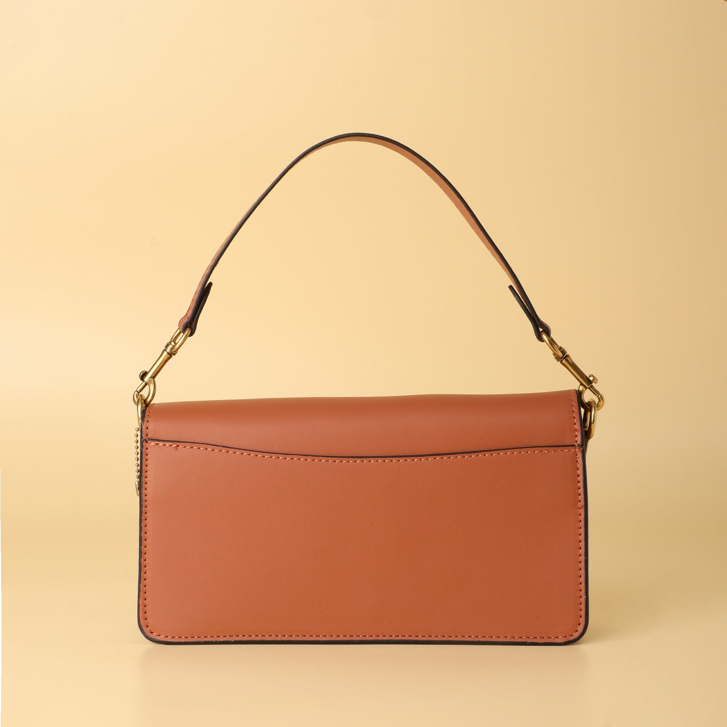 Tabby Shoulder Bag in Tan Signature Canvas