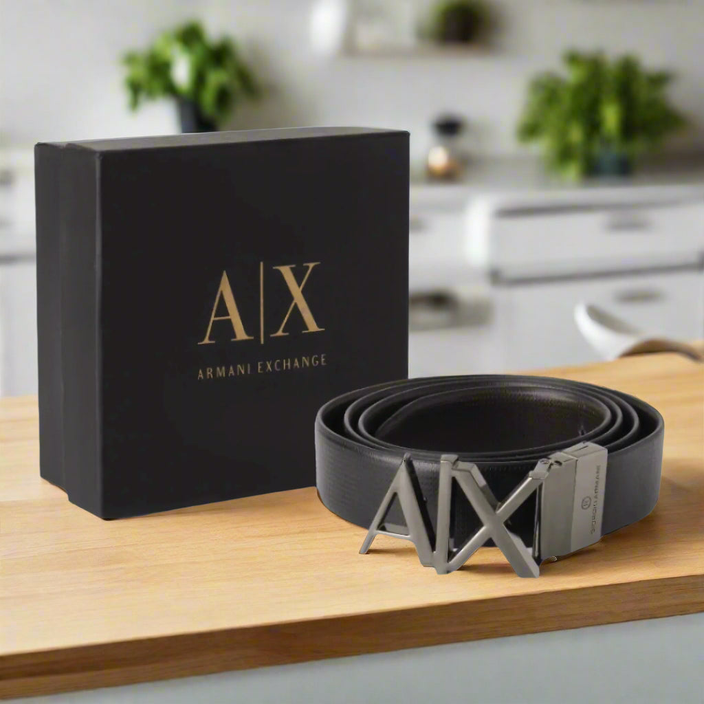Black Armani Exchange belt with branded box on a white background