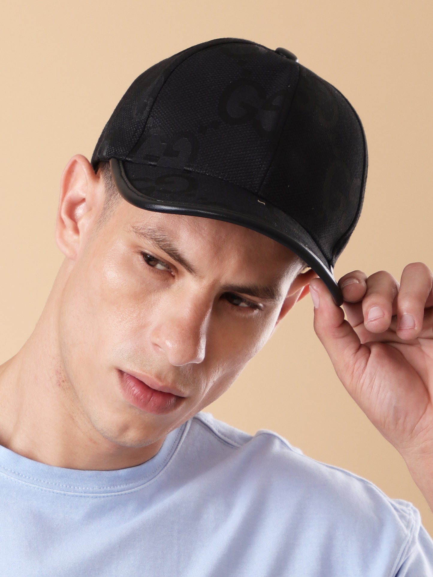 Sleek Black 'GG' Pattern Cap - Textured Design & Faux Leather Brim